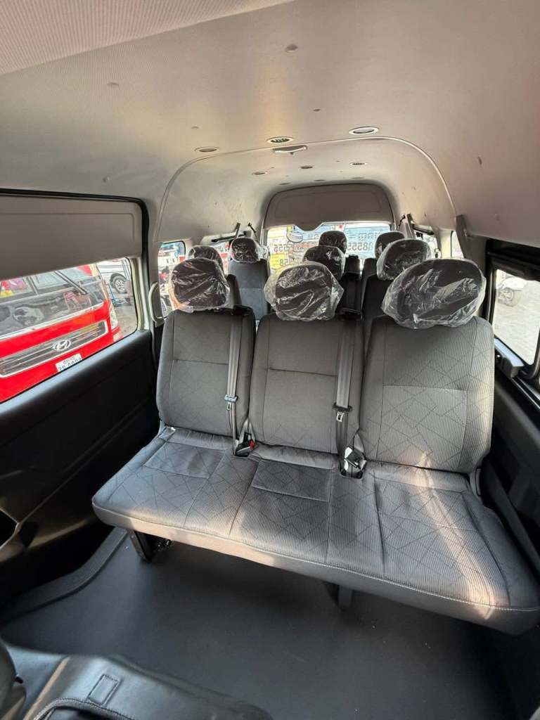 CMR Chan Moly Roth Transport bus at the SihanoukVille Tourist Port.