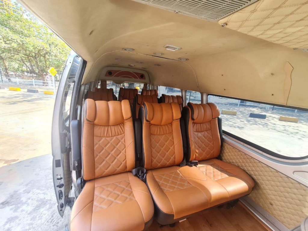 Soryka Bus and S.R.T. express bus at the SihanoukVille Tourist Port.