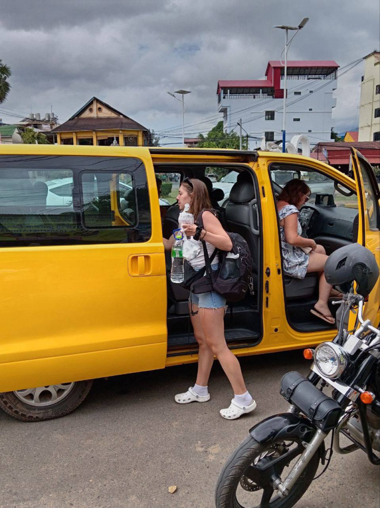 Yellow bus cambodia at the SihanoukVille Tourist Port.